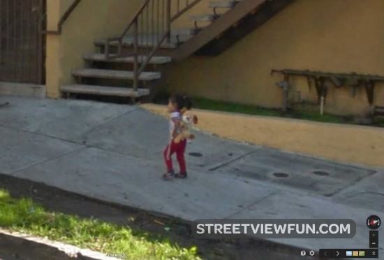 little-girl-hugged-dog